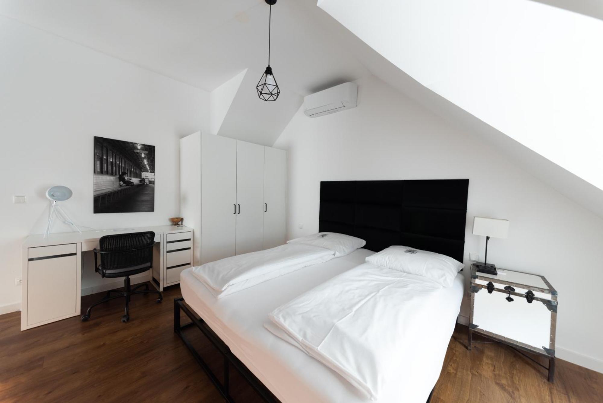 Design-Loft Und Apartments مولهايم ان الرور دير الغرفة الصورة